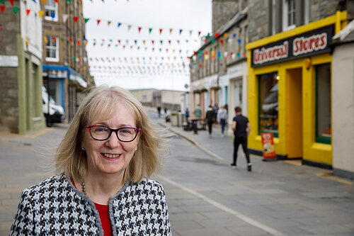 Beatrice Wishart MSP standing in the Street in Lerwick