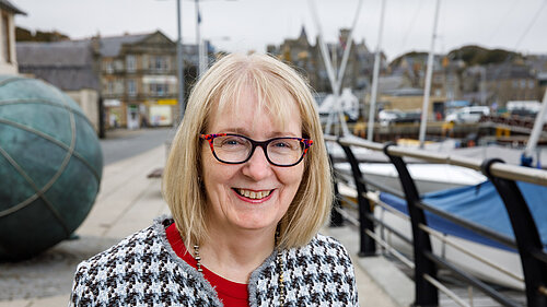 Beatrice Wishart infront of Lerwick harbour