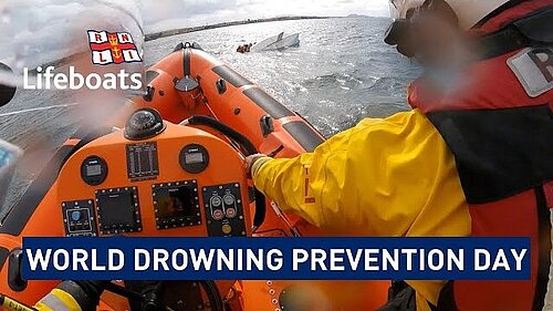 RNLI lifeboat at sea with the words 'world drowning prevention day'